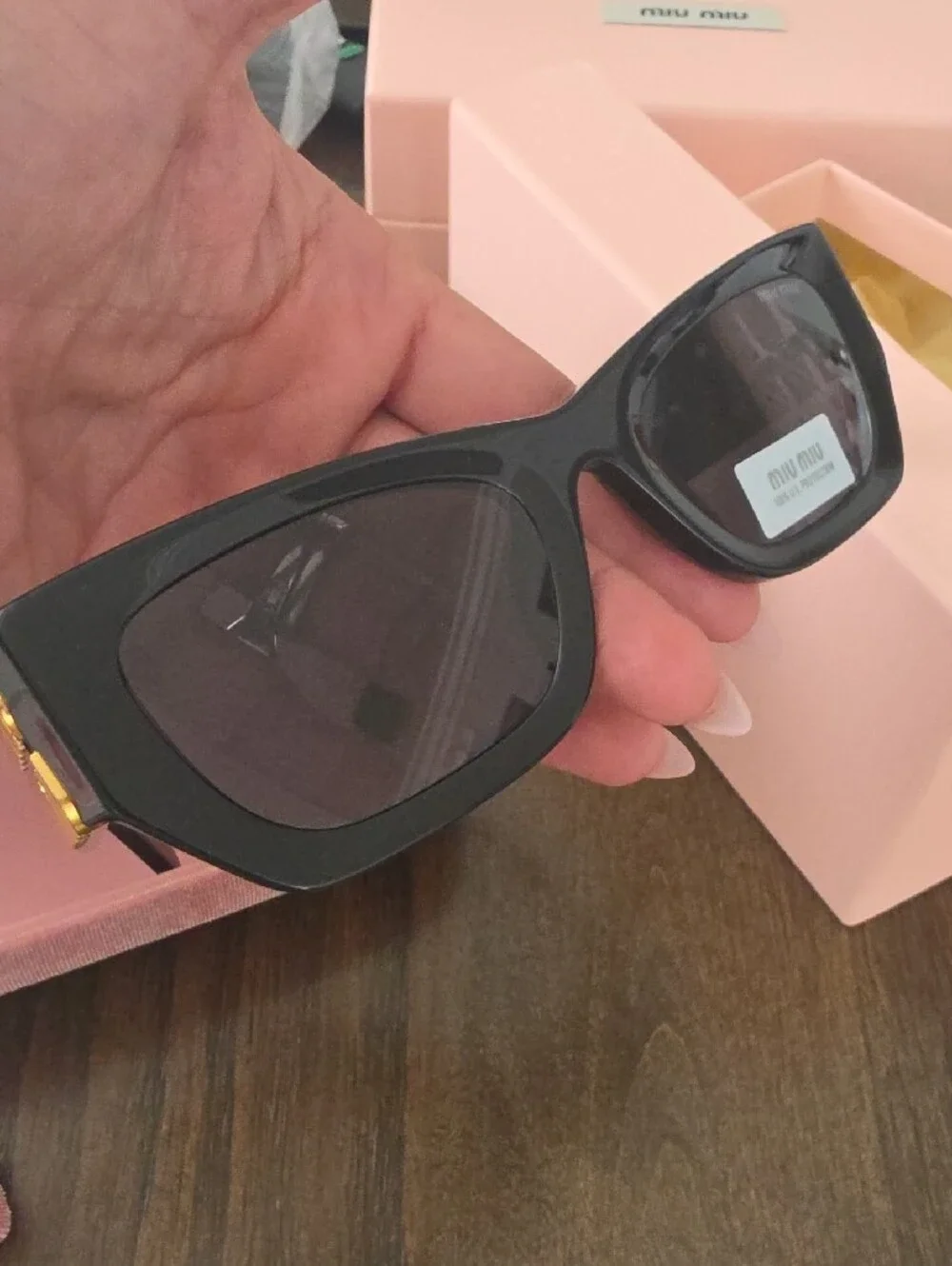 Miu Miu Glossy Black Cat-Eye Sunglasses with Pink Velvet Case